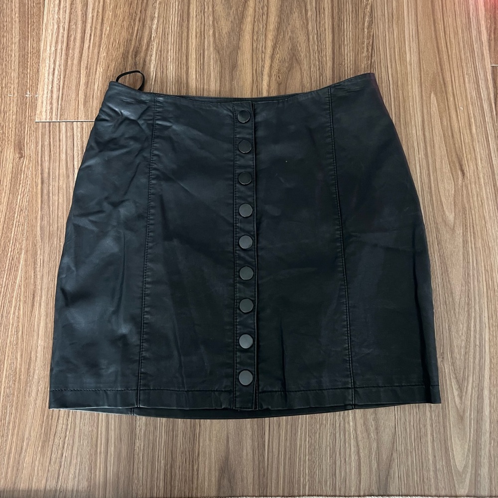 Free People black faux leather skirt
Size 4